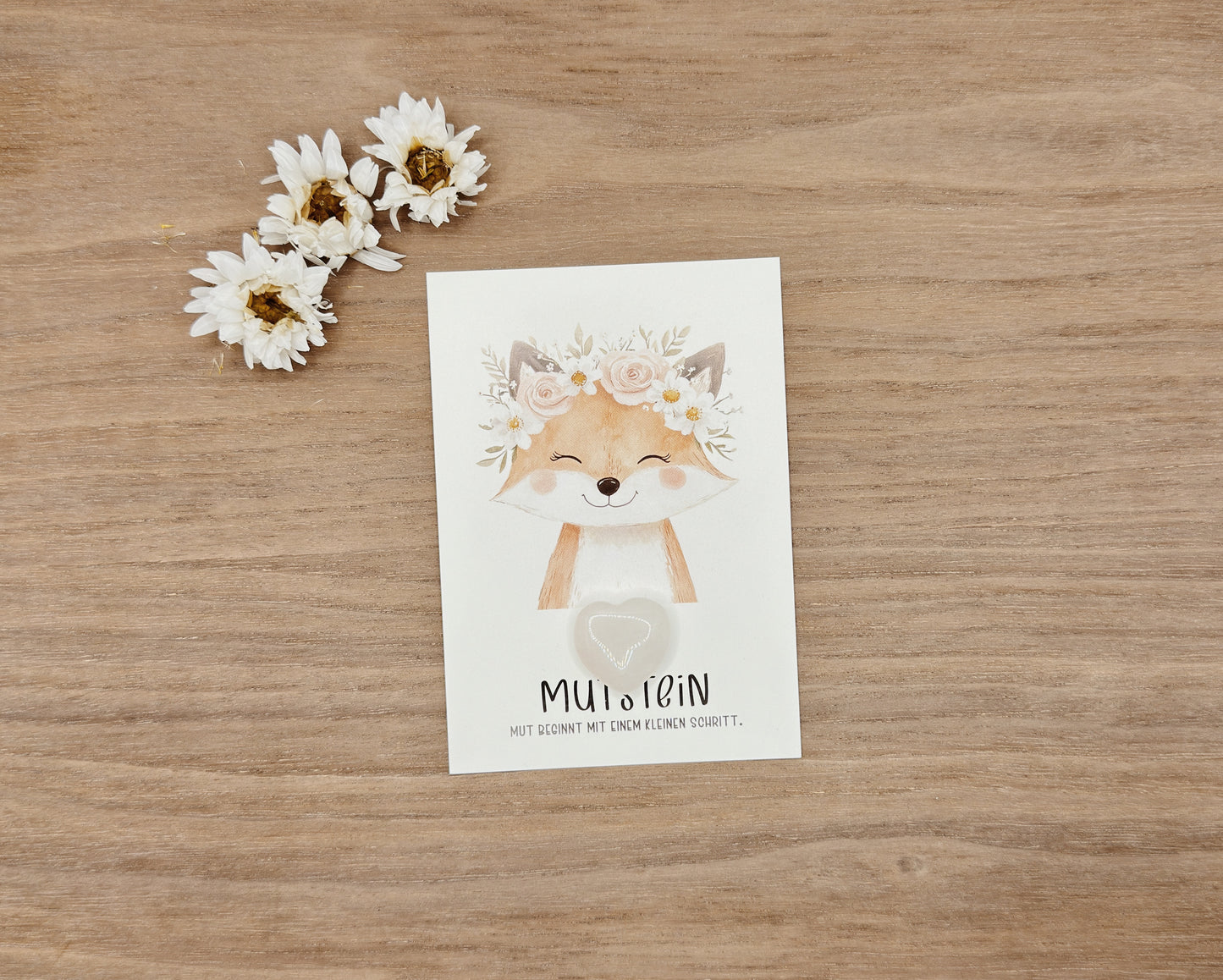 Mutstein Fuchs mit Blumenkranz