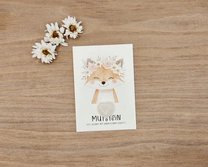 Mutstein Fuchs mit Blumenkranz