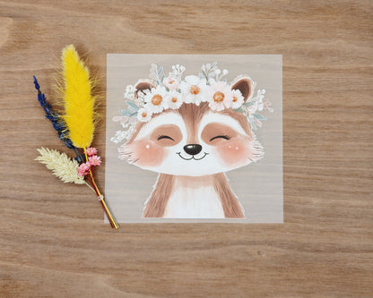 Bügelbild Waschbär mit Blumenkranz
